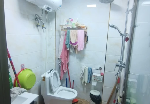 坐落在東榜路65號7號樓1梯位703室的房產及相應的土地使用權[不動產權證號：20180011817]